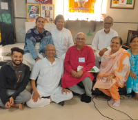 Group photo of volunteers and participants after a camp