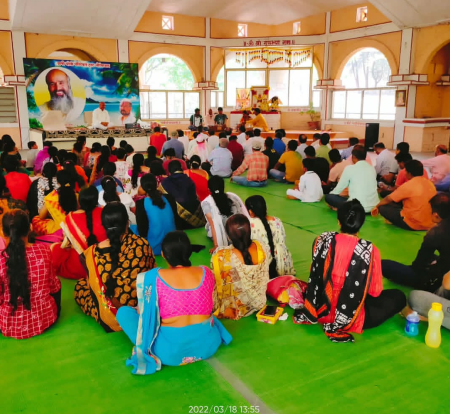 Camp participants seated on the floor for a meditation session